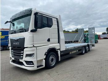 Camión portavehículos MAN Arbeitsbühnen Baumaschinentransporter mit Rampen