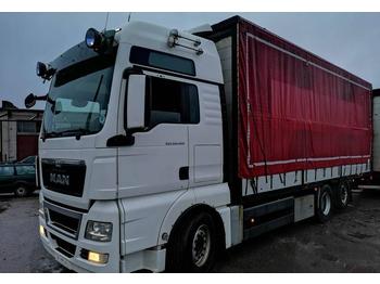 Camión toldo MAN TGX 26.400 6X2-2LL EURO 5