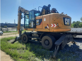 Excavadora de ruedas CATERPILLAR MH3024