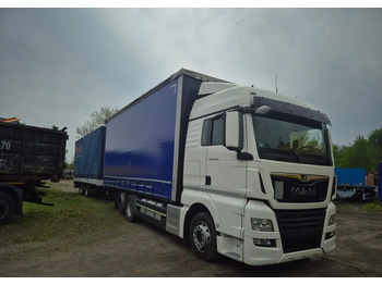 Camión lona MAN TGX 26.460