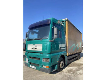 Camión lona MAN TGA 18.310