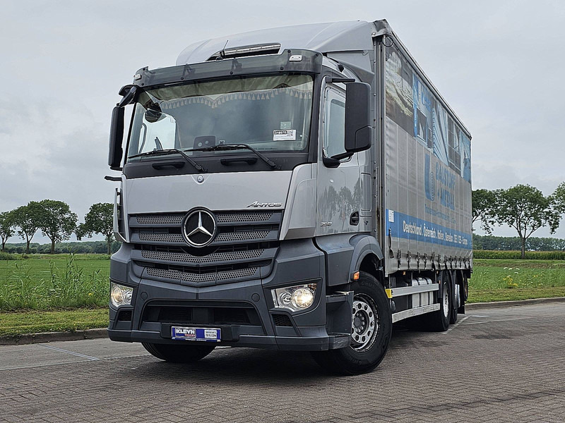 Mercedes-Benz ANTOS 2543 + FORKLIFT PALFINGER - Camión lona: foto 1 Mercedes-Benz ANTOS 2543 + FORKLIFT PALFINGER - Camión lona: foto 1