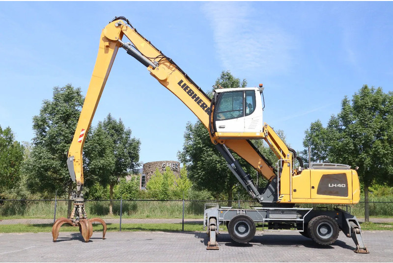Liebherr LH 40 M LITRONIC | GRAB | QUICK COUPLER | 16 METER - Excavadora de ruedas: foto 1 Liebherr LH 40 M LITRONIC | GRAB | QUICK COUPLER | 16 METER - Excavadora de ruedas: foto 1