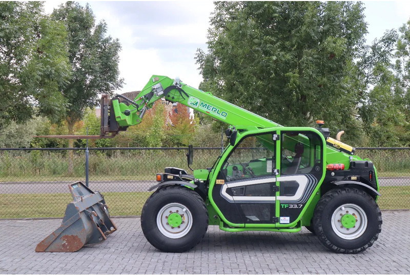 Merlo TF33.7-115LC TURBOFARMER | 40KM/H | BSS | FORKS | BUCKET - Manipulador telescópico: foto 1 Merlo TF33.7-115LC TURBOFARMER | 40KM/H | BSS | FORKS | BUCKET - Manipulador telescópico: foto 1
