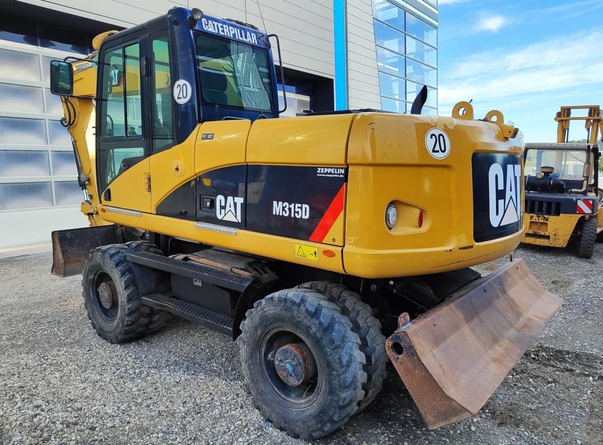 Caterpillar M315D - Excavadora de ruedas: foto 1 Caterpillar M315D - Excavadora de ruedas: foto 1