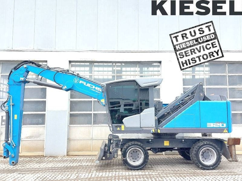 Fuchs MHL 320 F - Manipulador de materiales: foto 1 Fuchs MHL 320 F - Manipulador de materiales: foto 1