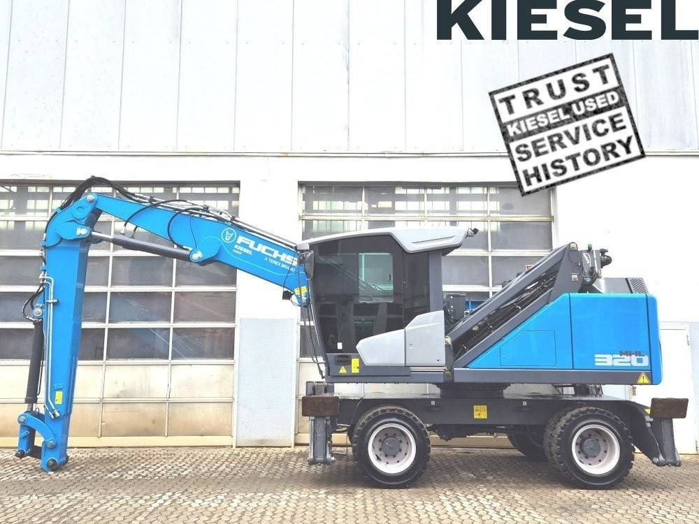 Fuchs MHL 320 F - Manipulador de materiales: foto 1 Fuchs MHL 320 F - Manipulador de materiales: foto 1