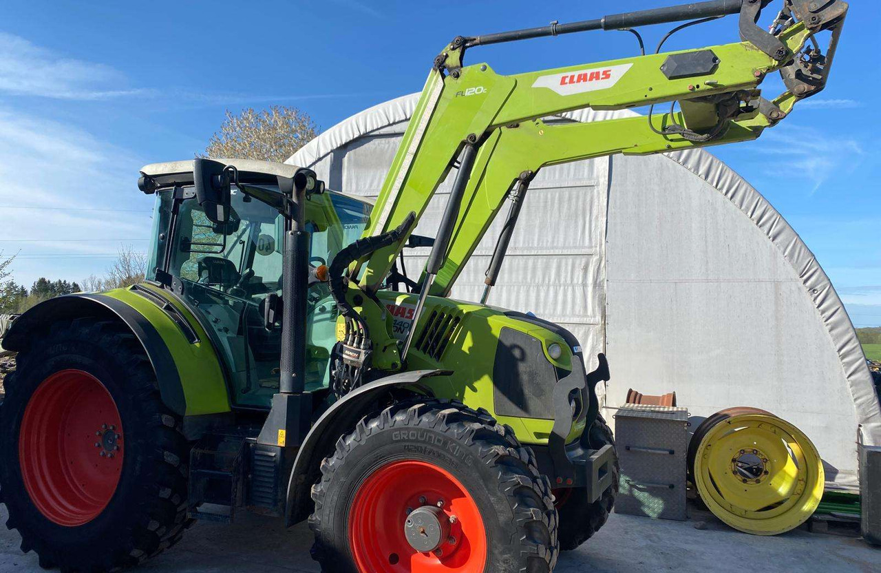Claas Arion 440 su Claaas front.kr. - Tractor: foto 1 Claas Arion 440 su Claaas front.kr. - Tractor: foto 1