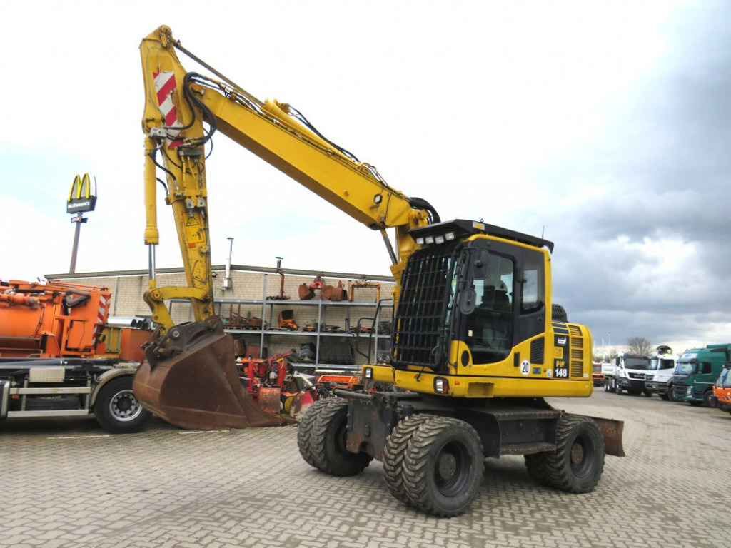 KOMATSU HANOMAG Mobilbagger PW 148 - 8 Bagger 6.824h Deutsch top - Excavadora de ruedas: foto 1 KOMATSU HANOMAG Mobilbagger PW 148 - 8 Bagger 6.824h Deutsch top - Excavadora de ruedas: foto 1