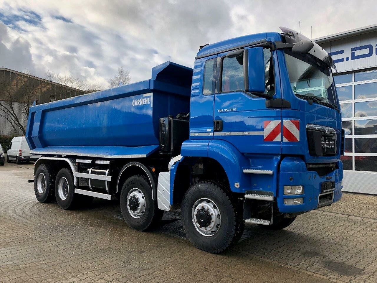 MAN TGS 35.440 8x8 Euro 5 Muldenkipper Carnehl 17m3 - Camión volquete: foto 1 MAN TGS 35.440 8x8 Euro 5 Muldenkipper Carnehl 17m3 - Camión volquete: foto 1