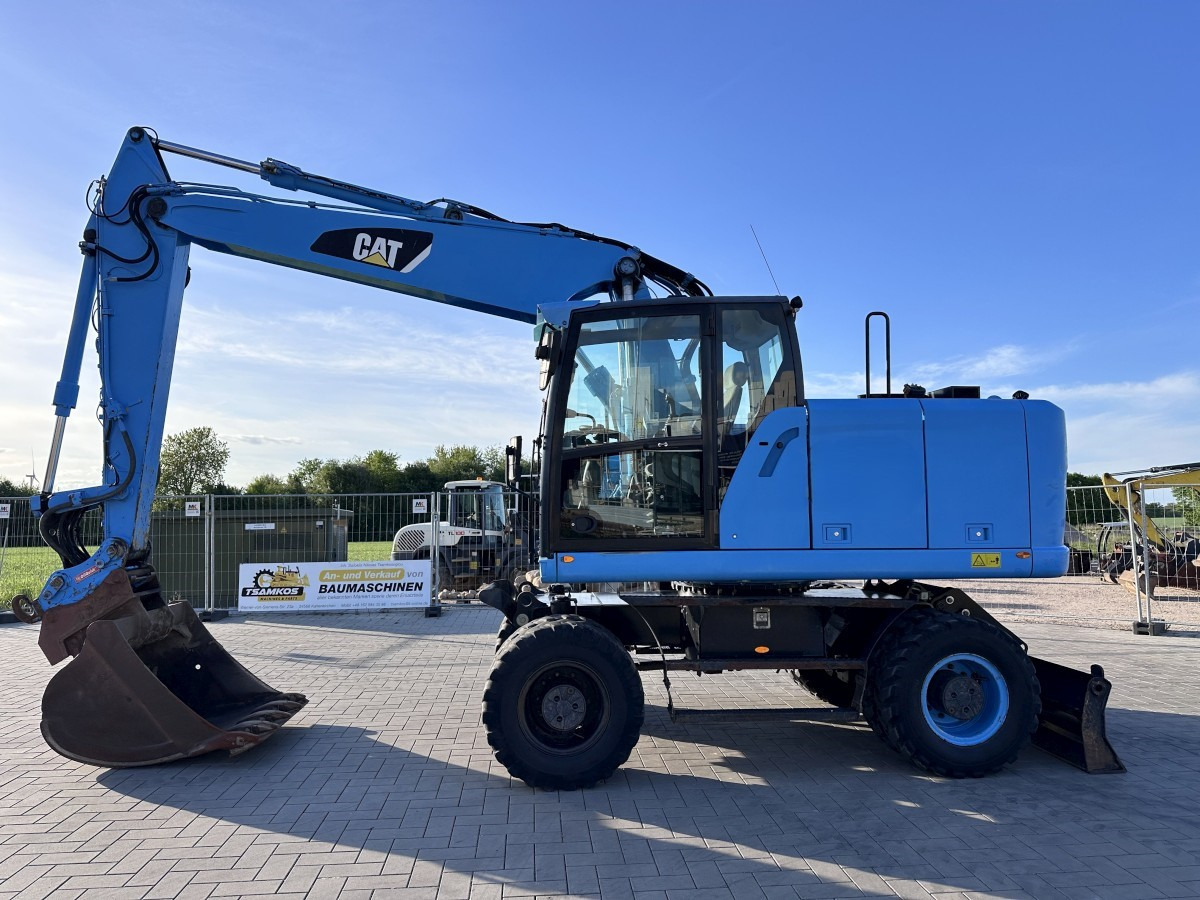 CATERPILLAR M 318 F Oil Quick OQ 65 Deutsche Maschine Top ! - Excavadora de ruedas: foto 1 CATERPILLAR M 318 F Oil Quick OQ 65 Deutsche Maschine Top ! - Excavadora de ruedas: foto 1