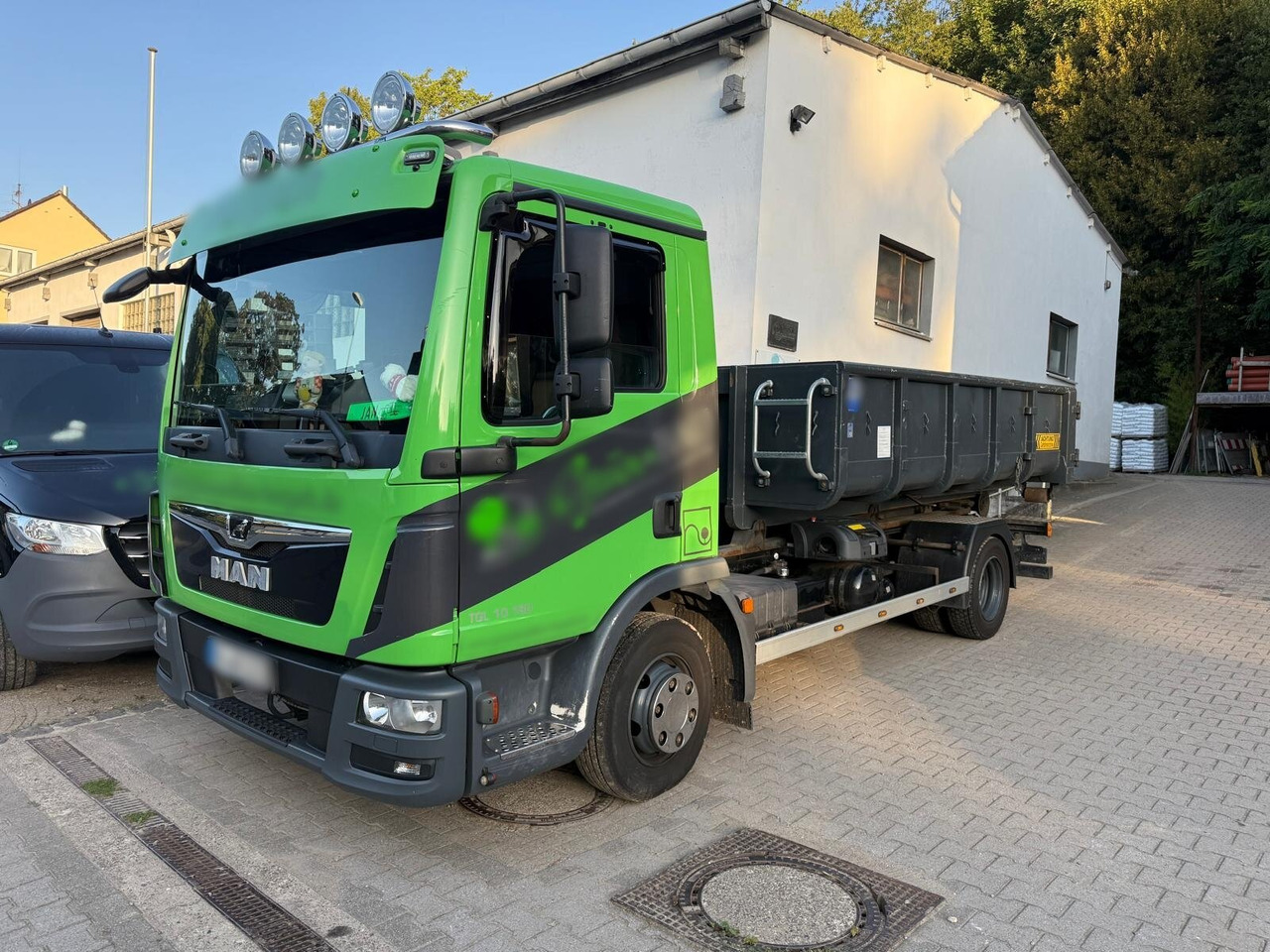 MAN TGL 10.180 4x2 BL TGL 10.180 4x2 BL City-Abrollkipper - Camión multibasculante: foto 1 MAN TGL 10.180 4x2 BL TGL 10.180 4x2 BL City-Abrollkipper - Camión multibasculante: foto 1