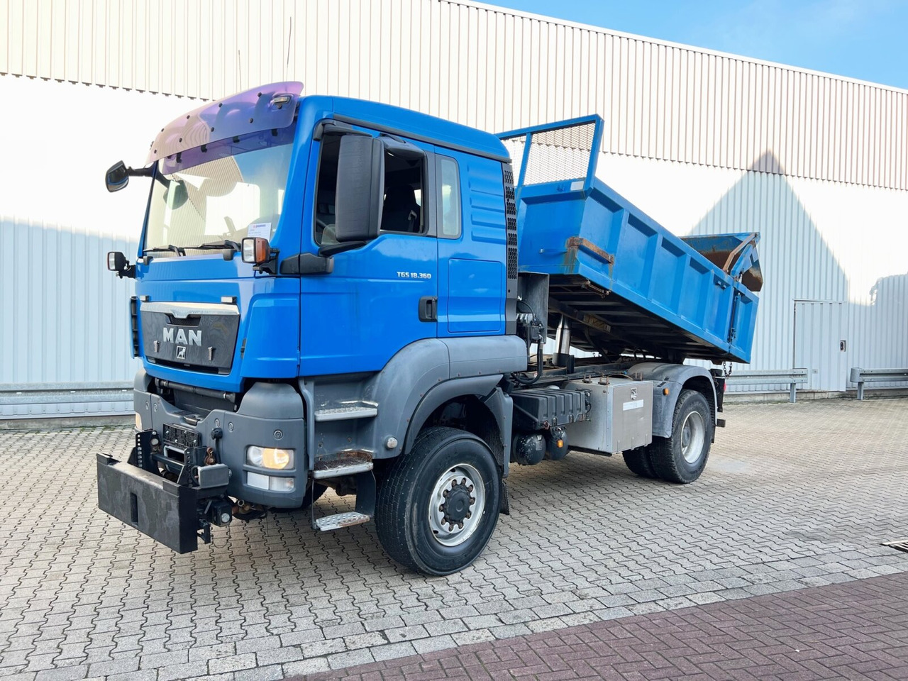 MAN TGS 18.360 4X4 BL TGS 18.360 4X4 BL, Hinterkipper, hydr. Heckklappe, Winterdienstausstattung - Camión volquete: foto 1 MAN TGS 18.360 4X4 BL TGS 18.360 4X4 BL, Hinterkipper, hydr. Heckklappe, Winterdienstausstattung - Camión volquete: foto 1