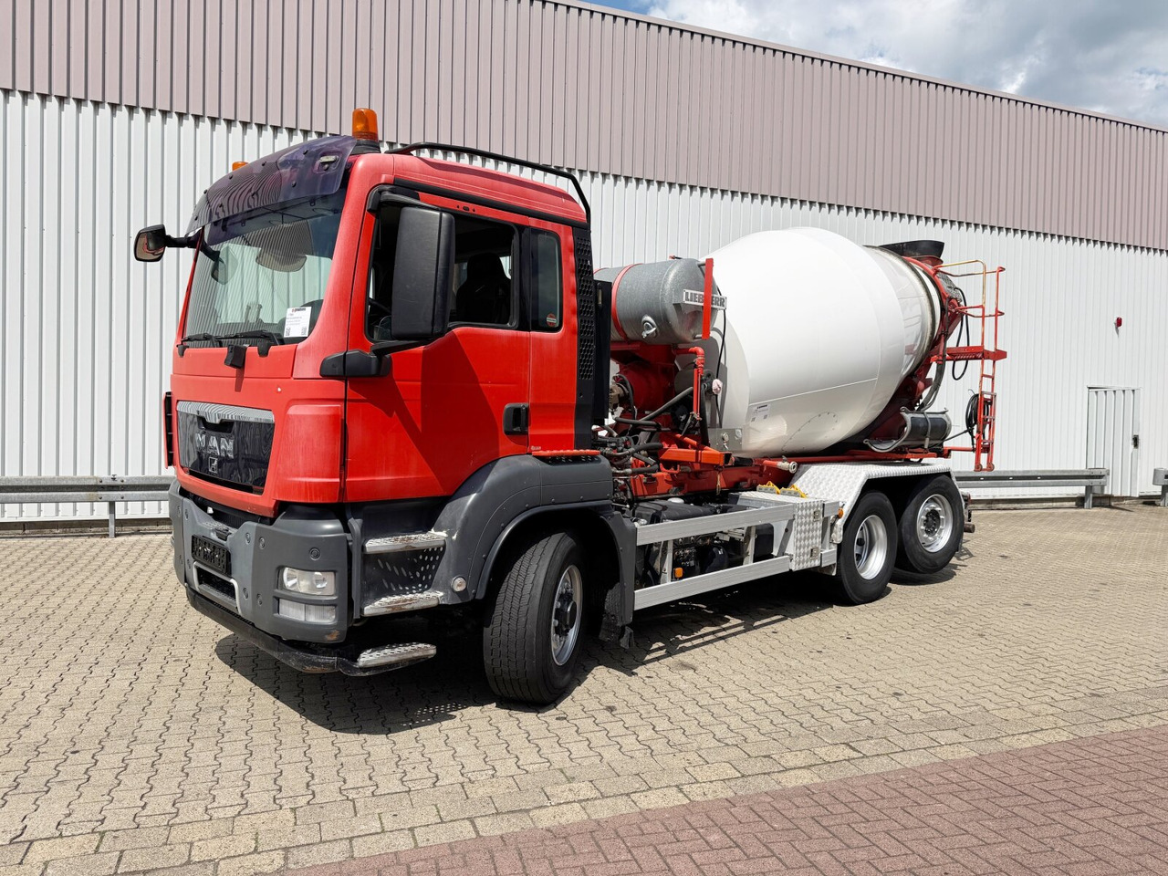 MAN TGS 26.480 6x4H-4 BL TGS 26.480 6x4H-4 BL, Liebherr HTM 704, Multilift Abroller HydroDrive, Lenk-/Liftachse, Wechselfahrzeug - Camión hormigonera: foto 1 MAN TGS 26.480 6x4H-4 BL TGS 26.480 6x4H-4 BL, Liebherr HTM 704, Multilift Abroller HydroDrive, Lenk-/Liftachse, Wechselfahrzeug - Camión hormigonera: foto 1