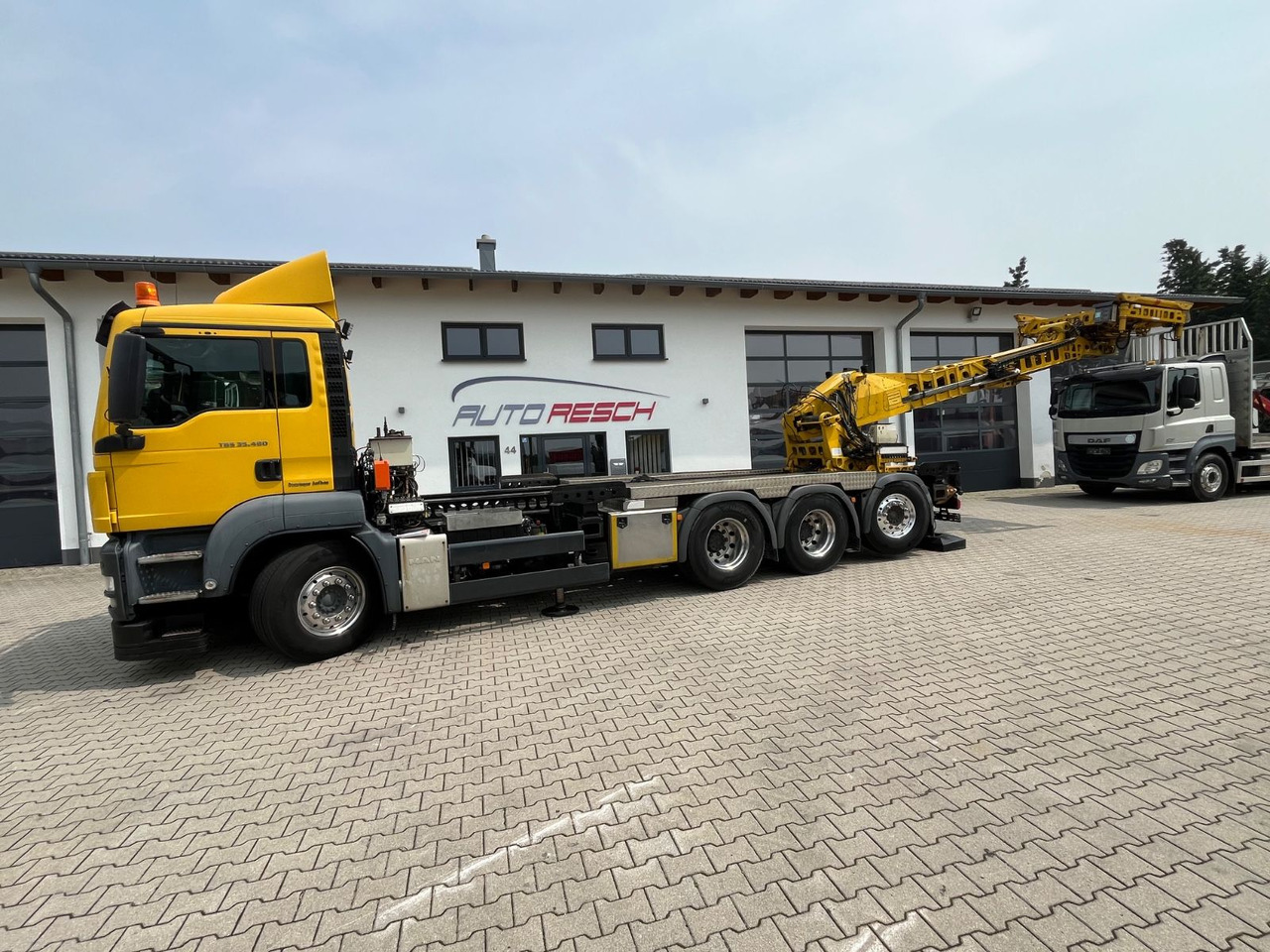 MAN TGS 35.480 8x4-4BL Deuringer Garagentransporter - Camión grúa: foto 4 MAN TGS 35.480 8x4-4BL Deuringer Garagentransporter - Camión grúa: foto 4