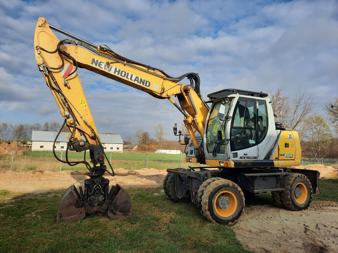 NEW HOLLAND WE150C - Excavadora de ruedas: foto 1 NEW HOLLAND WE150C - Excavadora de ruedas: foto 1