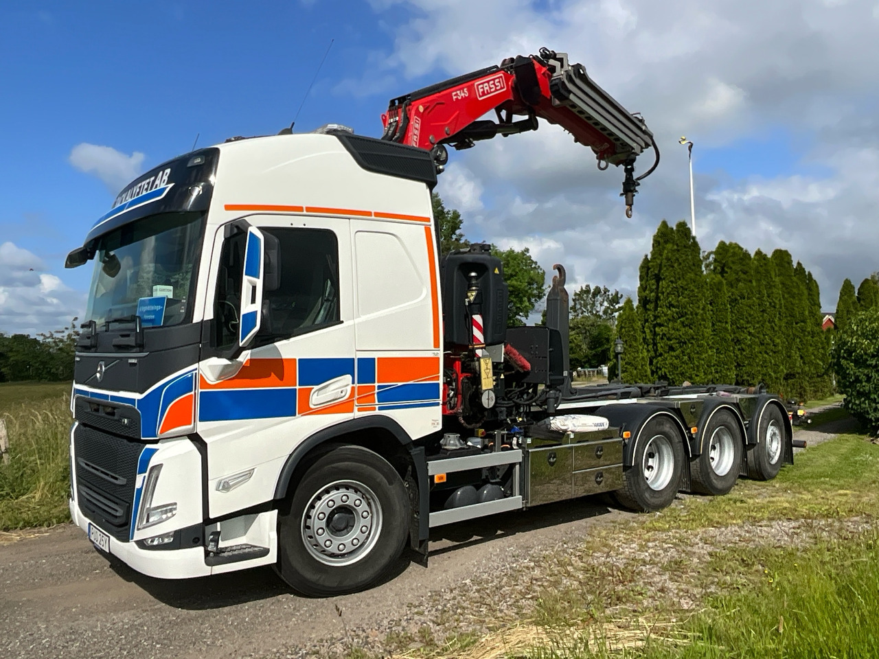 Volvo FM13 - Camión multibasculante: foto 1 Volvo FM13 - Camión multibasculante: foto 1