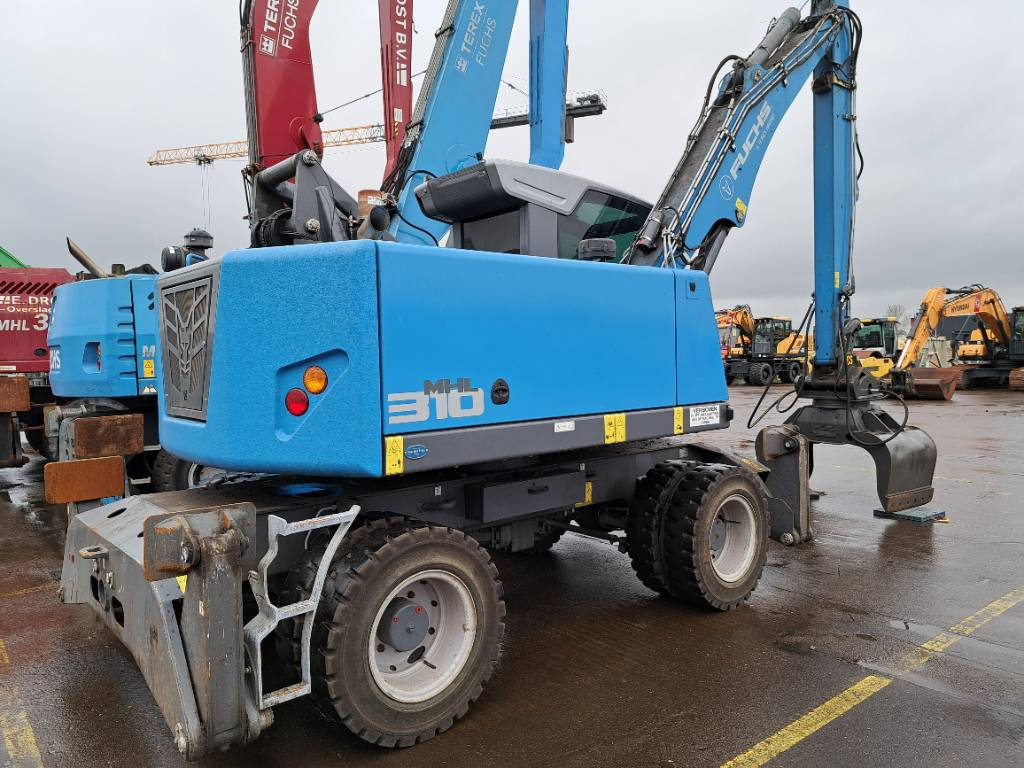 Fuchs MHL310F + Grapple - Manipulador de materiales: foto 1 Fuchs MHL310F + Grapple - Manipulador de materiales: foto 1