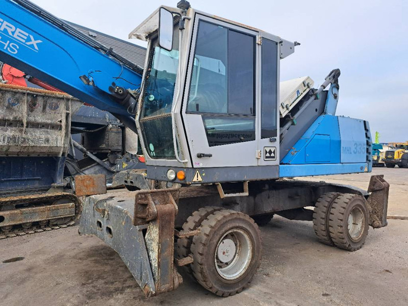 Fuchs MHL335 - Manipulador de materiales: foto 4 Fuchs MHL335 - Manipulador de materiales: foto 4