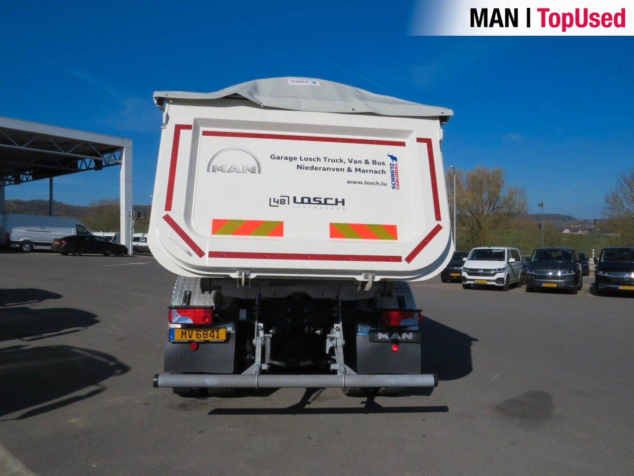 MAN TGS 41.480 8x4 BB CH Schmitz Muldenkipper - Camión portacontenedor de cadenas: foto 4 MAN TGS 41.480 8x4 BB CH Schmitz Muldenkipper - Camión portacontenedor de cadenas: foto 4