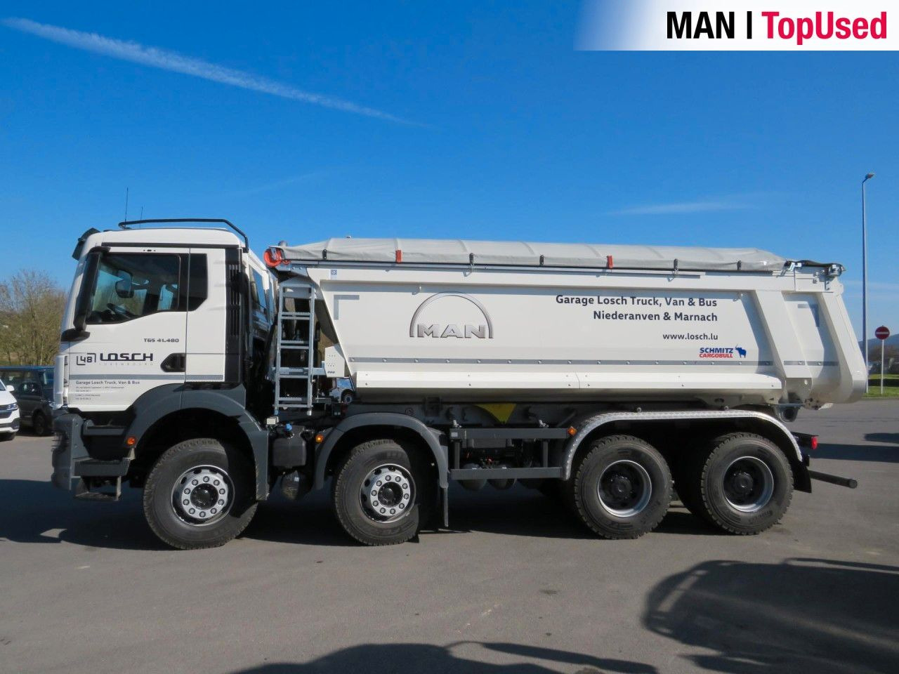 MAN TGS 41.480 8x4 BB CH Schmitz Muldenkipper - Camión portacontenedor de cadenas: foto 2 MAN TGS 41.480 8x4 BB CH Schmitz Muldenkipper - Camión portacontenedor de cadenas: foto 2