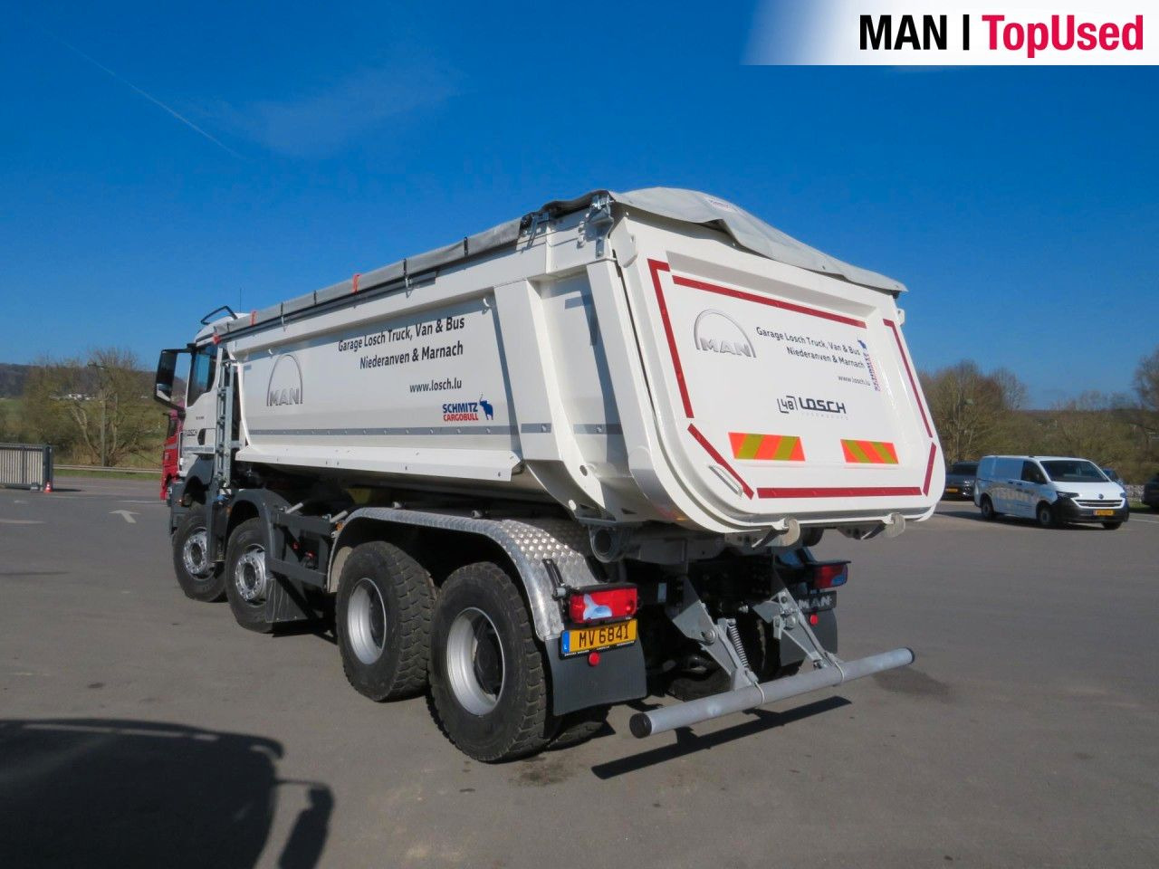 MAN TGS 41.480 8x4 BB CH Schmitz Muldenkipper - Camión portacontenedor de cadenas: foto 3 MAN TGS 41.480 8x4 BB CH Schmitz Muldenkipper - Camión portacontenedor de cadenas: foto 3