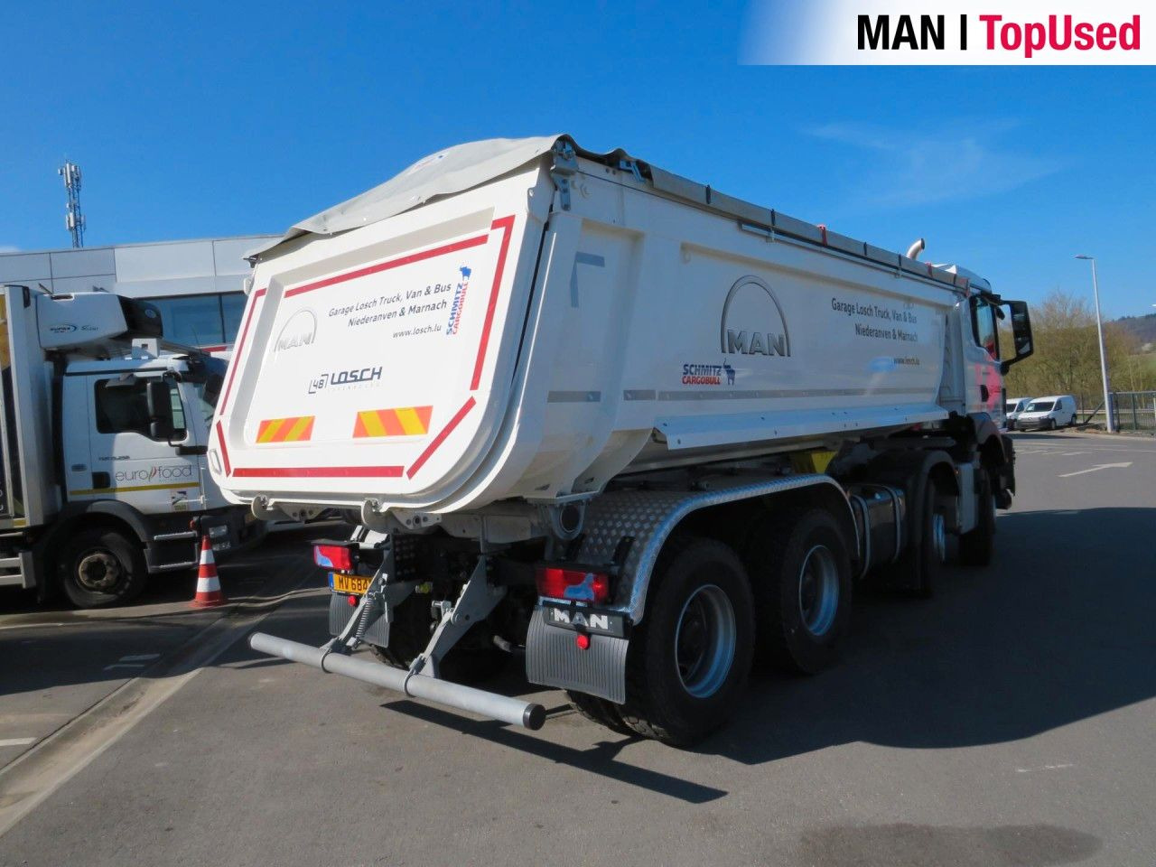 MAN TGS 41.480 8x4 BB CH Schmitz Muldenkipper - Camión portacontenedor de cadenas: foto 5 MAN TGS 41.480 8x4 BB CH Schmitz Muldenkipper - Camión portacontenedor de cadenas: foto 5