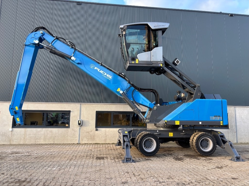 Fuchs MHL 331 F - MHL331 - MHL335 - Manipulador de materiales: foto 2 Fuchs MHL 331 F - MHL331 - MHL335 - Manipulador de materiales: foto 2