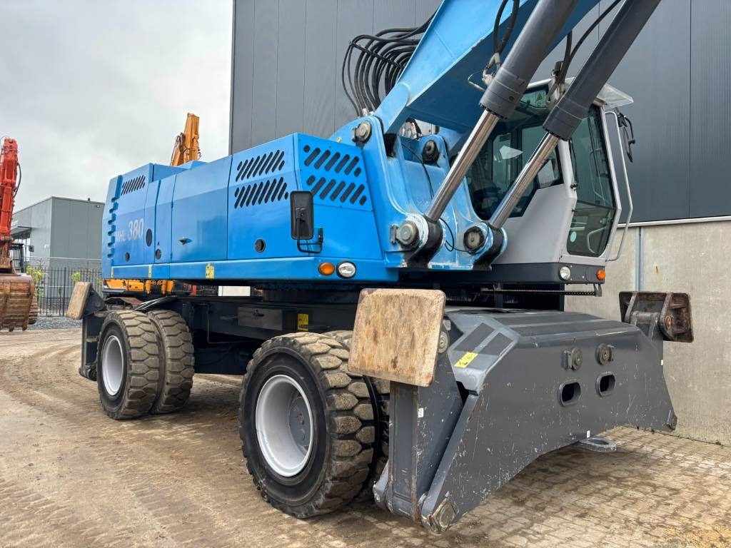 Manipulador de materiales Fuchs MHL 380 -- only 6650 real working hours: foto 31