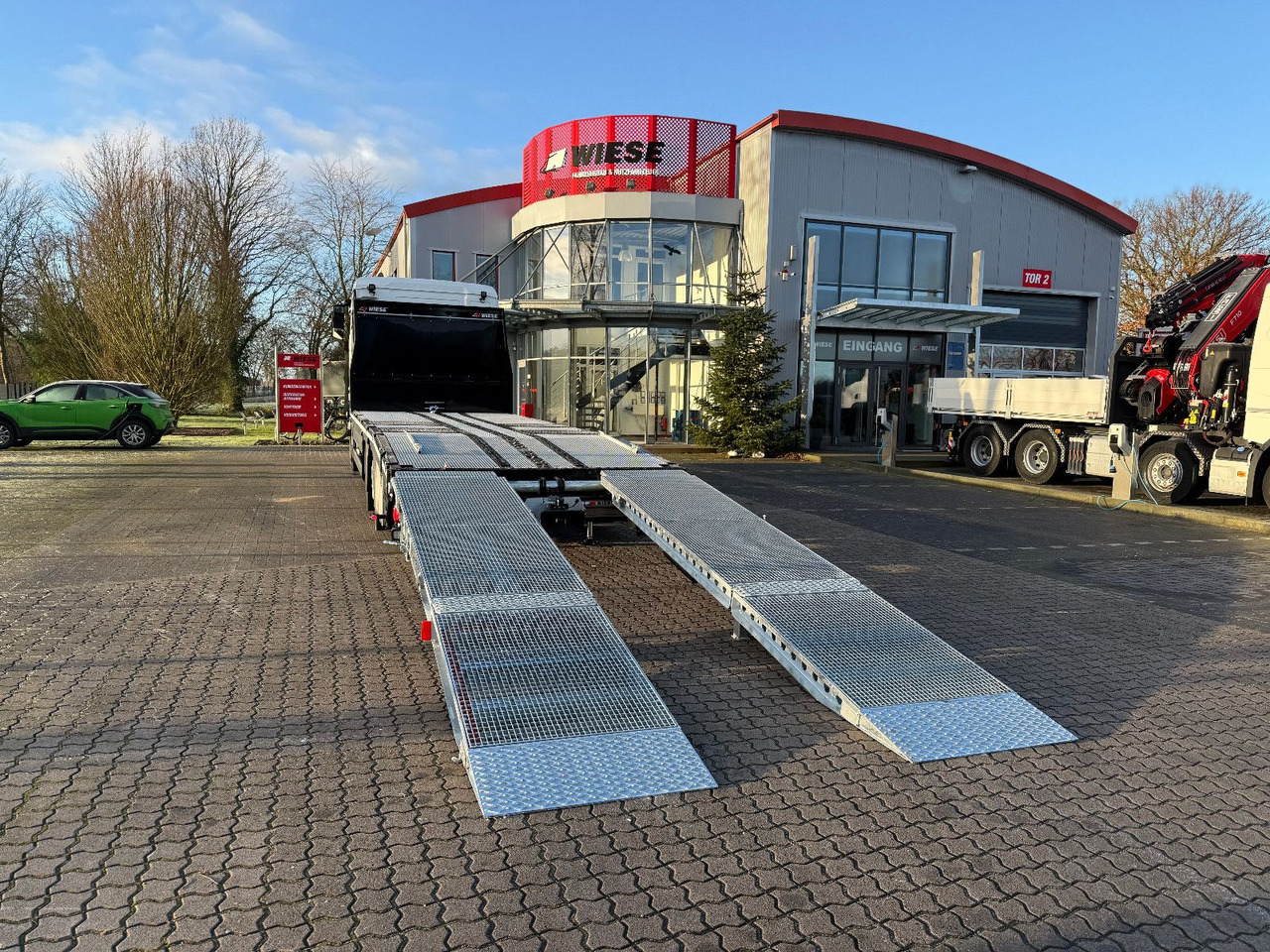 MAN Baumaschinen-  Arbeitsbühnentransporter Rampen - Camión portavehículos: foto 4 MAN Baumaschinen-  Arbeitsbühnentransporter Rampen - Camión portavehículos: foto 4