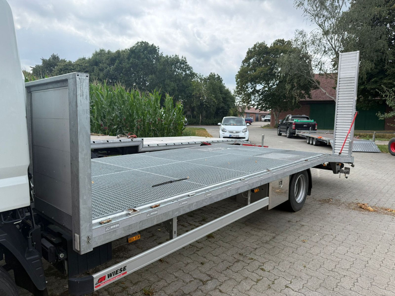 Mitsubishi Fuso Canter 7C18 Arbeitsbühnentransporter - Camión portavehículos: foto 4 Mitsubishi Fuso Canter 7C18 Arbeitsbühnentransporter - Camión portavehículos: foto 4