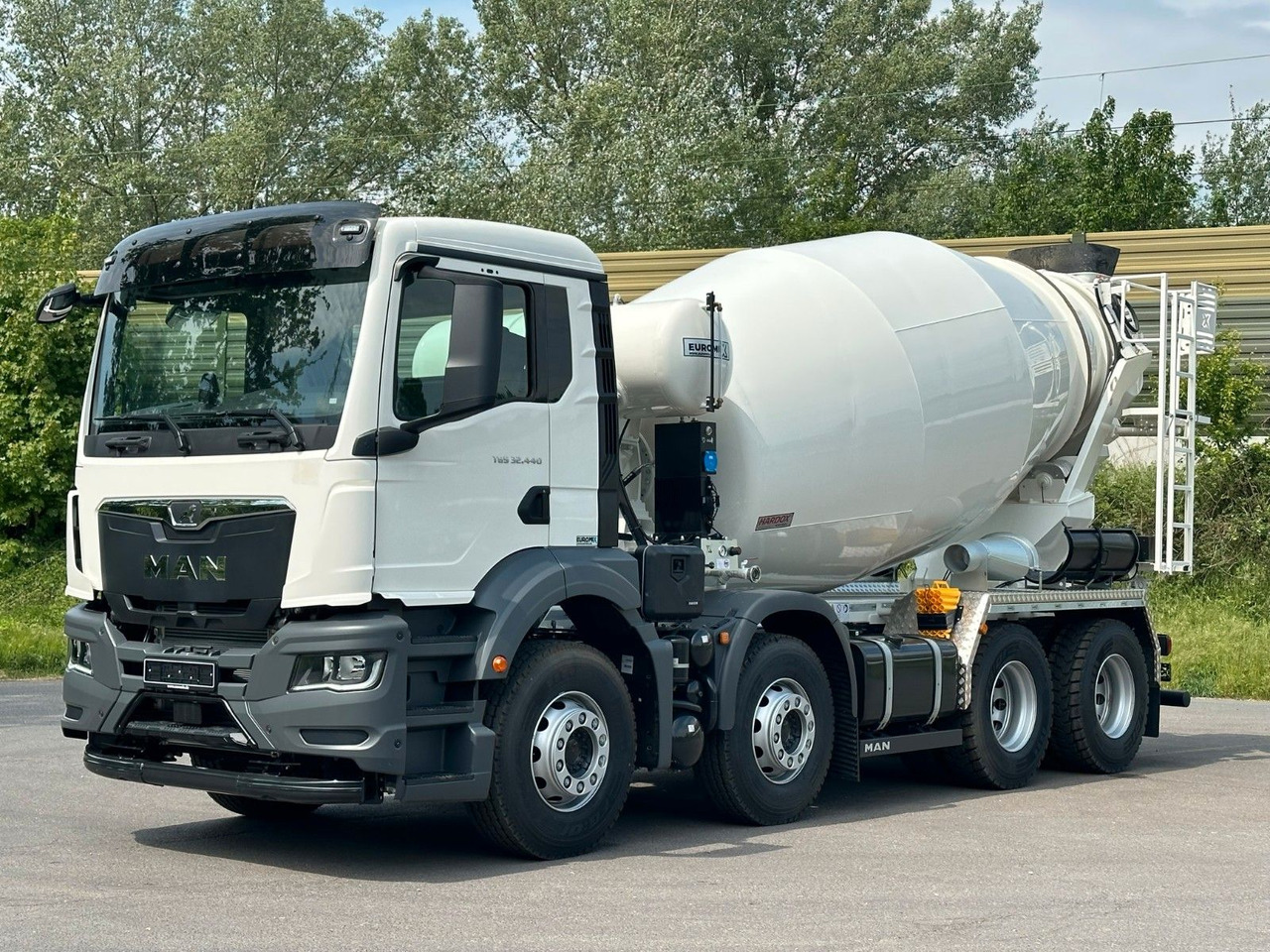 MAN TGS 32.440 8x4 / Euromix MTP EM 9 L - Camión hormigonera: foto 1 MAN TGS 32.440 8x4 / Euromix MTP EM 9 L - Camión hormigonera: foto 1