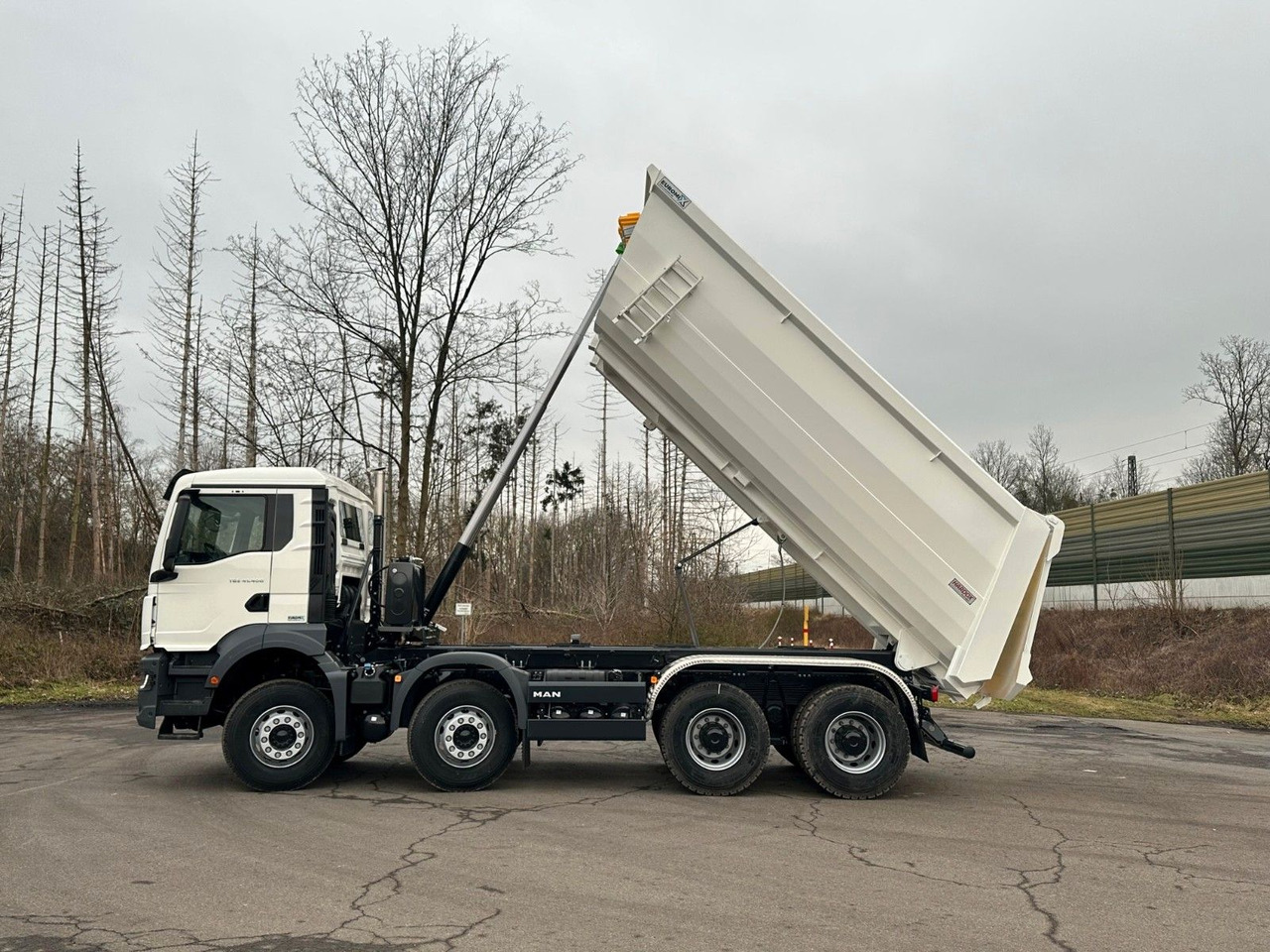 MAN TGS 41.400 8x4 / EUROMIX MTP 20m³/ EURO 5 - Camión portacontenedor de cadenas: foto 4 MAN TGS 41.400 8x4 / EUROMIX MTP 20m³/ EURO 5 - Camión portacontenedor de cadenas: foto 4