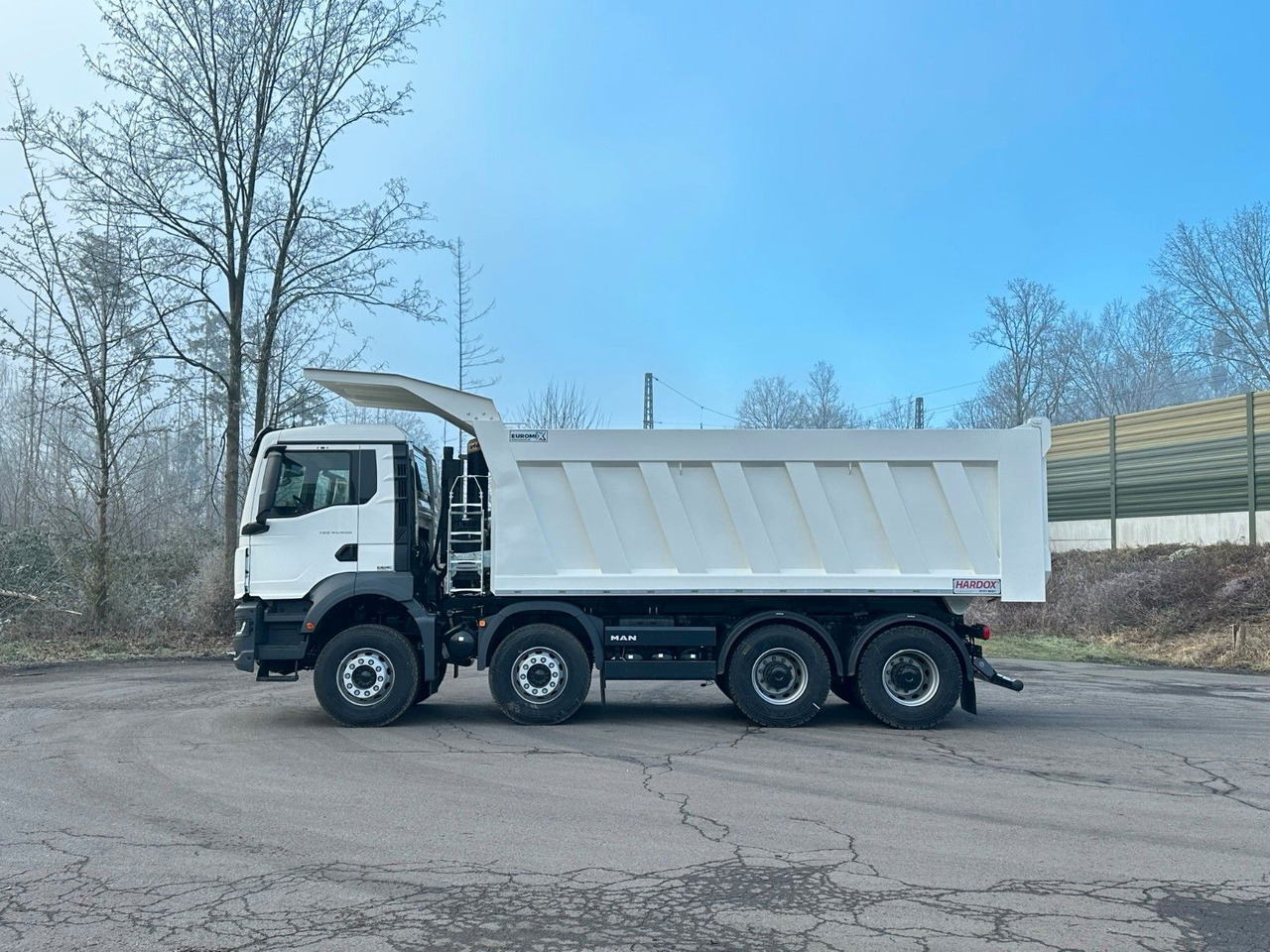 MAN TGS 41.400 8x4 / EUROMIX MTP 23m³/ Eckige Mulde - Camión volquete: foto 2 MAN TGS 41.400 8x4 / EUROMIX MTP 23m³/ Eckige Mulde - Camión volquete: foto 2