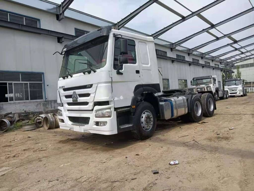 Sinotruk HOWO 6*4 Tractor - Camión portacontenedore/ Intercambiable: foto 1 Sinotruk HOWO 6*4 Tractor - Camión portacontenedore/ Intercambiable: foto 1