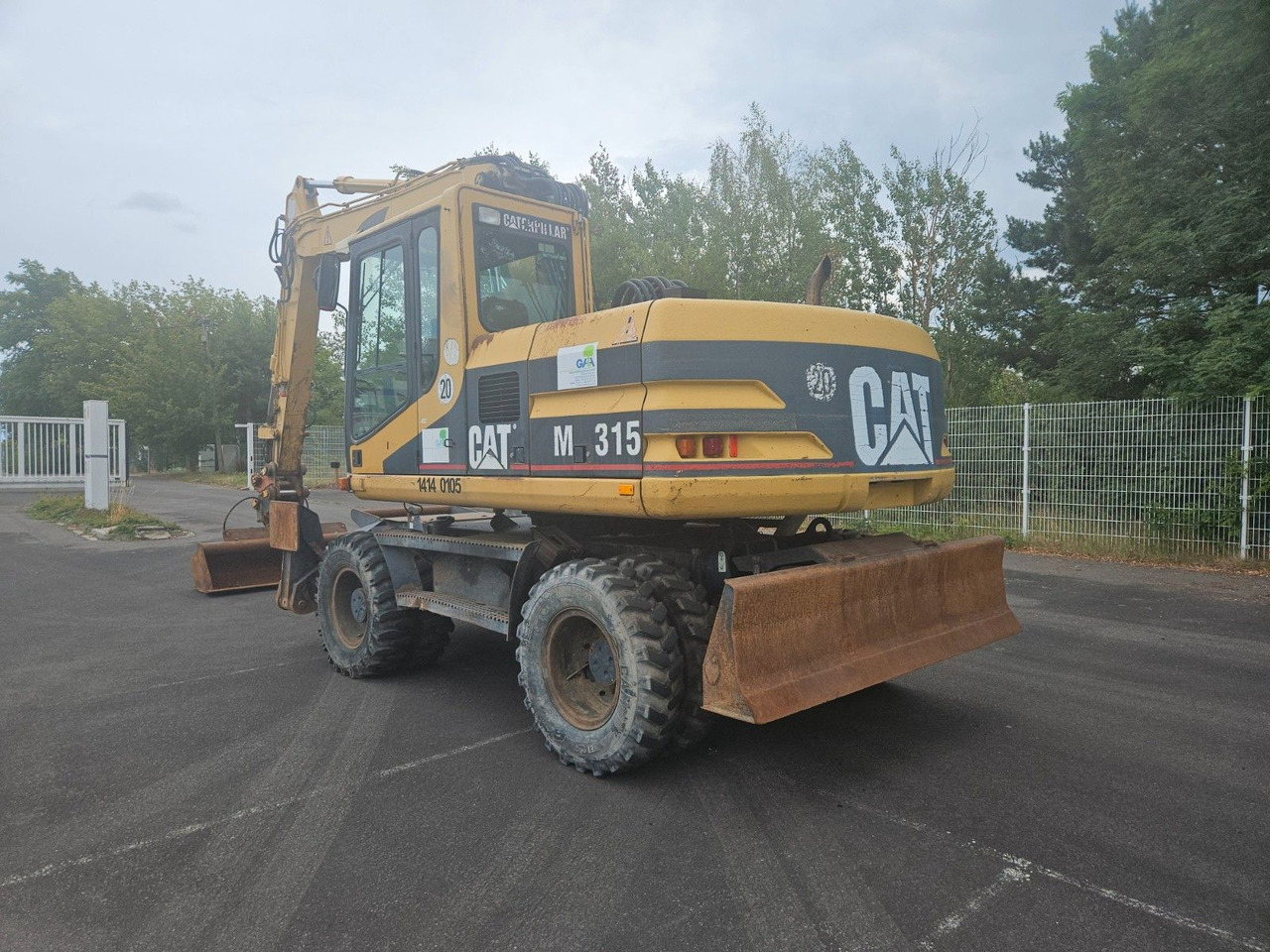 CAT M315 Mobilbagger mit Pratzen und Schild - Excavadora de ruedas: foto 2 CAT M315 Mobilbagger mit Pratzen und Schild - Excavadora de ruedas: foto 2