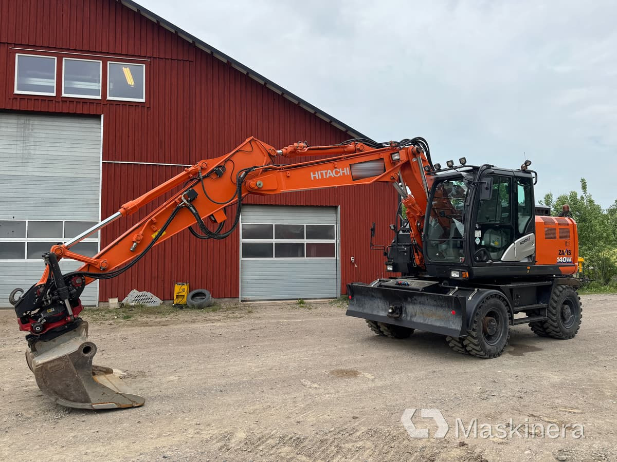 Hjulgrävare Hitachi Zaxis 140W med redskap - Excavadora de cadenas: foto 1 Hjulgrävare Hitachi Zaxis 140W med redskap - Excavadora de cadenas: foto 1