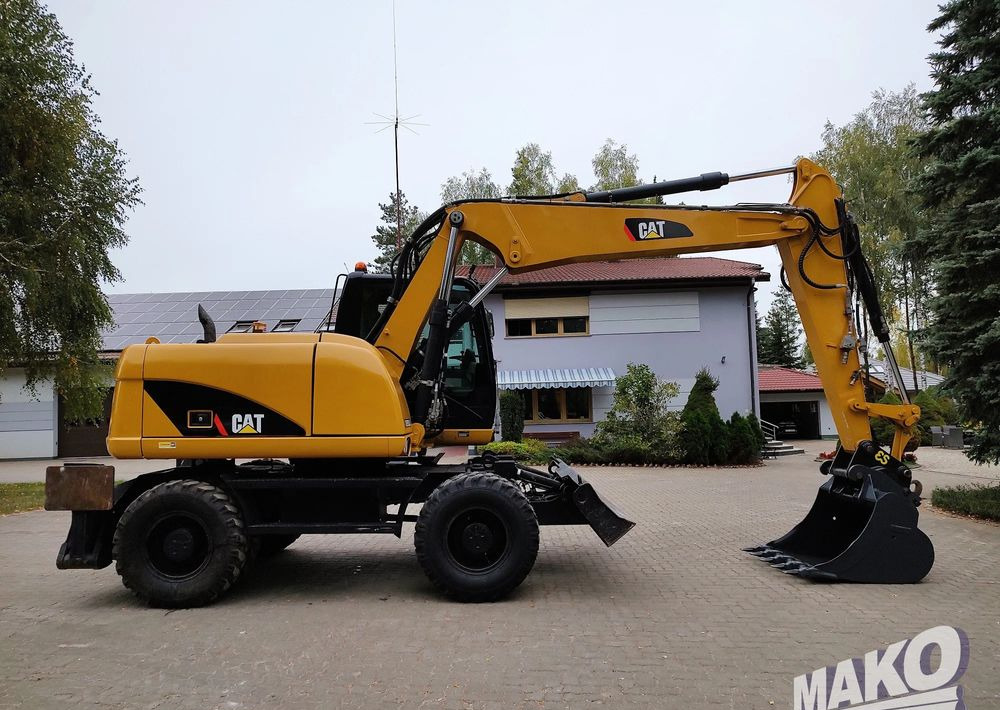 Caterpillar M313D - Excavadora de ruedas: foto 5 Caterpillar M313D - Excavadora de ruedas: foto 5