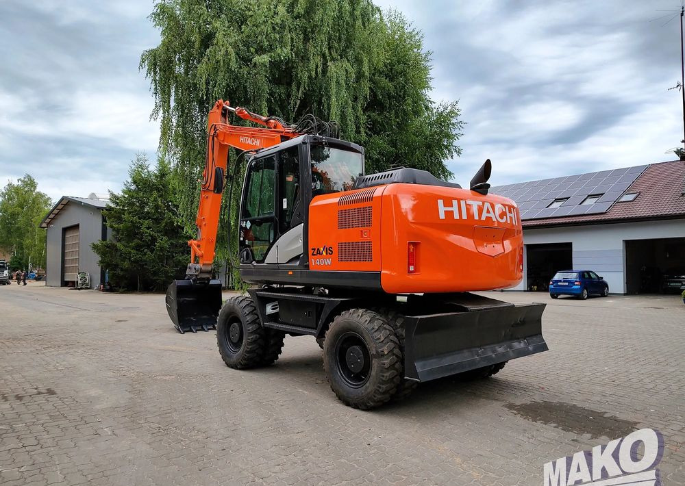 Hitachi ZX 140 - Excavadora de ruedas: foto 2 Hitachi ZX 140 - Excavadora de ruedas: foto 2
