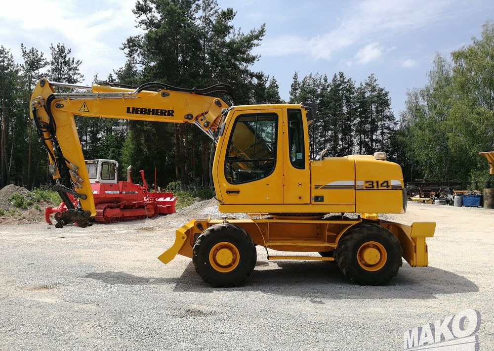 Liebherr A 314 Litronic - Excavadora de ruedas: foto 2 Liebherr A 314 Litronic - Excavadora de ruedas: foto 2