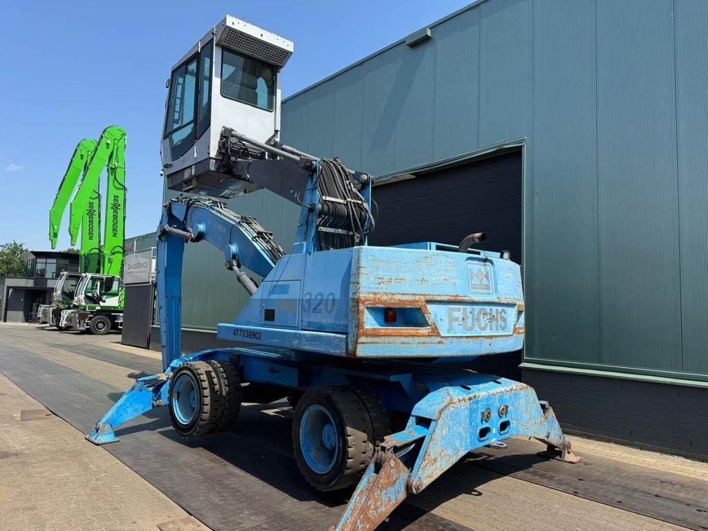 Fuchs MHL 320 - Manipulador de materiales: foto 3 Fuchs MHL 320 - Manipulador de materiales: foto 3