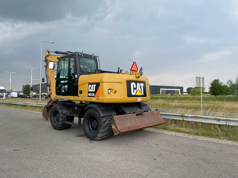 Caterpillar M313D - CE - Excavadora de ruedas: foto 1 Caterpillar M313D - CE - Excavadora de ruedas: foto 1