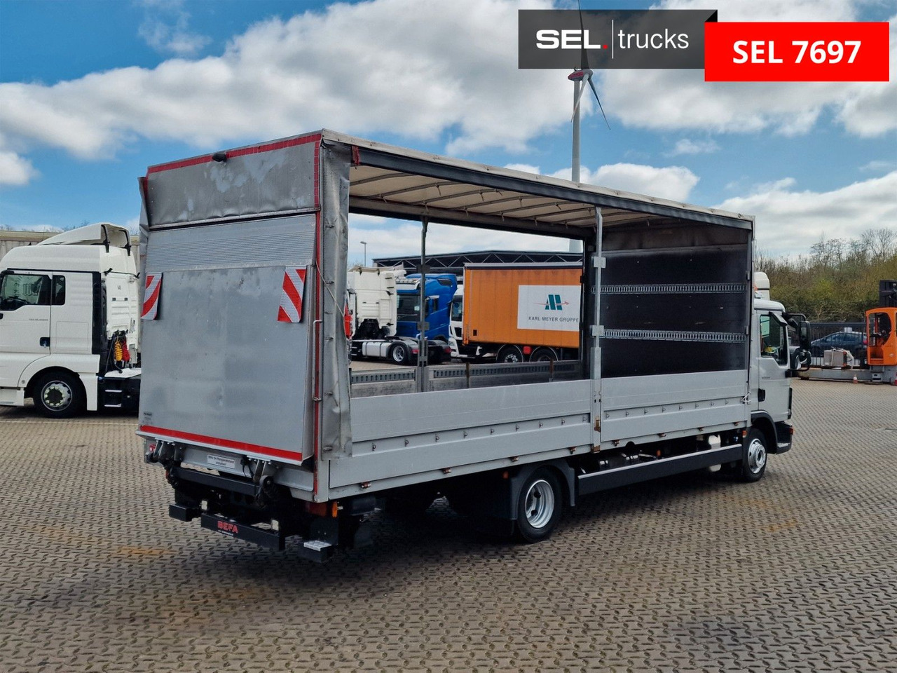 MAN TGL 8.180 4x2 BL / Ladebordwand - Furgoneta con caja de lona: foto 5 MAN TGL 8.180 4x2 BL / Ladebordwand - Furgoneta con caja de lona: foto 5