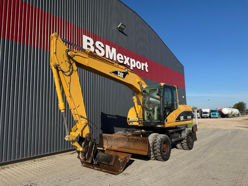 Caterpillar M 316 C - Excavadora de ruedas: foto 1 Caterpillar M 316 C - Excavadora de ruedas: foto 1