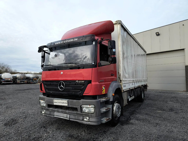 Mercedes-Benz Axor 1829 + D'HOLLANDIA 2000 KG - Camión lona: foto 1 Mercedes-Benz Axor 1829 + D'HOLLANDIA 2000 KG - Camión lona: foto 1