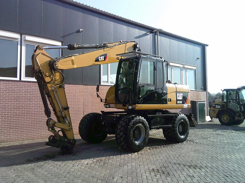 Caterpillar M315D - Excavadora de ruedas: foto 1 Caterpillar M315D - Excavadora de ruedas: foto 1