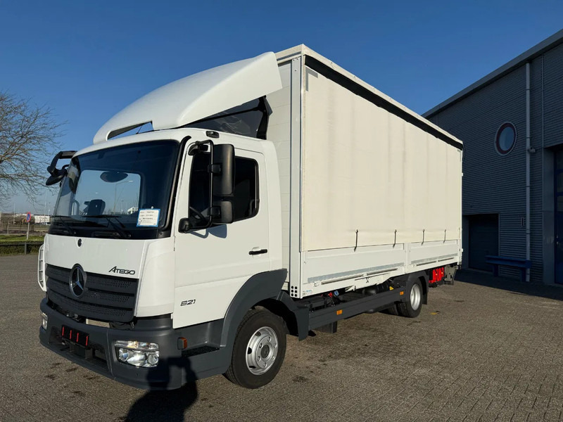 Mercedes-Benz Atego 821L / GERMAN TRUCK / ONLY:21672 KM / PLATFORM 1500KG / SMARTKEYS / CURTAIN SAILS / AIRCO / AUTOMATIC / EURO-6 / 2023 - Camión caja cerrada: foto 1 Mercedes-Benz Atego 821L / GERMAN TRUCK / ONLY:21672 KM / PLATFORM 1500KG / SMARTKEYS / CURTAIN SAILS / AIRCO / AUTOMATIC / EURO-6 / 2023 - Camión caja cerrada: foto 1