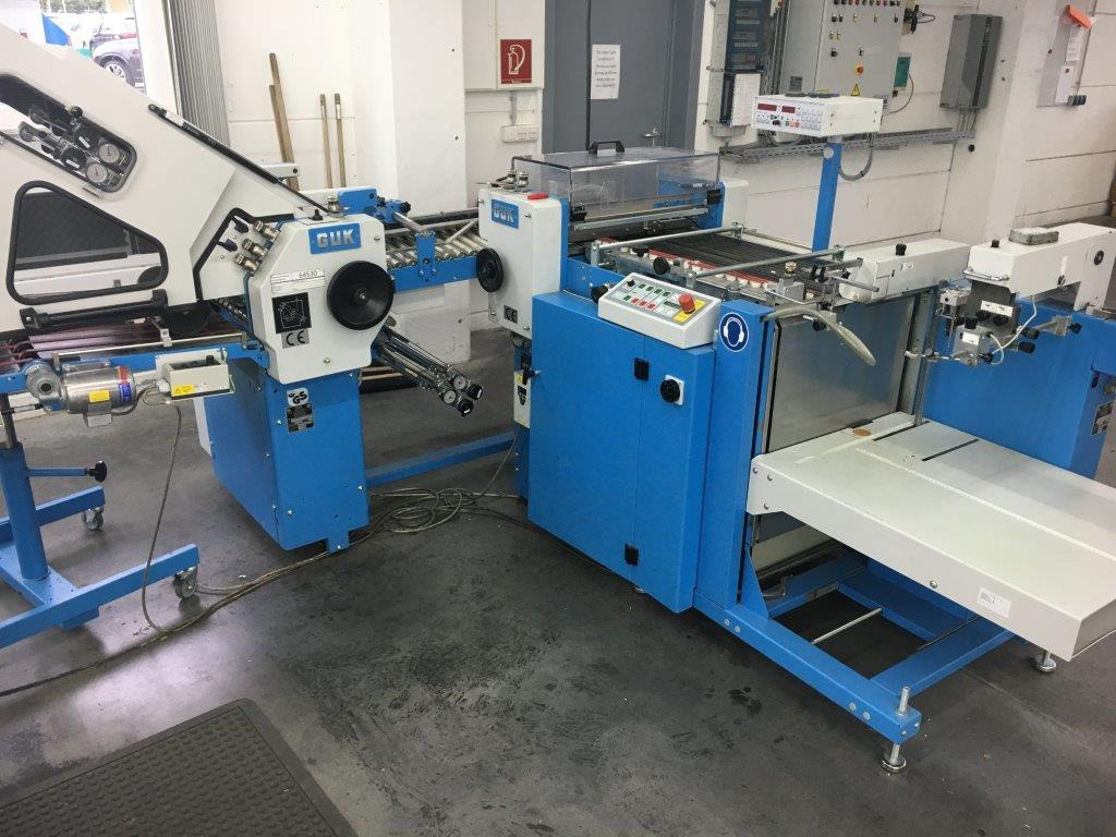 GUK SM 50-2 cutting machine with feeder - Encuadernadora: foto 1 GUK SM 50-2 cutting machine with feeder - Encuadernadora: foto 1