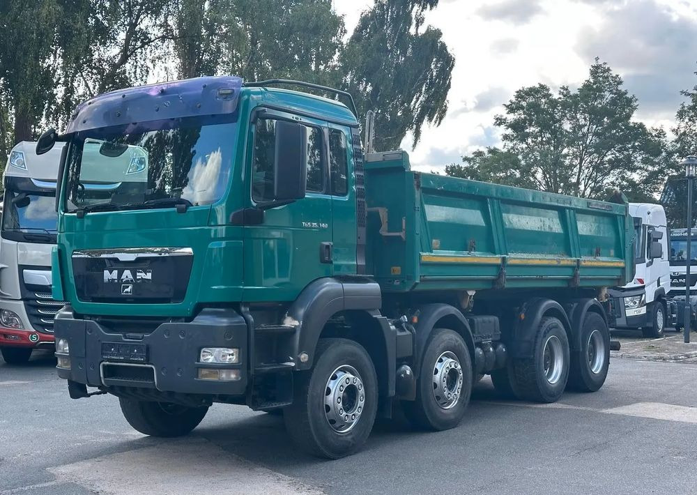 MAN TGS 35.440 8x4 Meiller Trójstronna wywrotka Bordmatik | Retarder | Euro 5 - Camión volquete: foto 1 MAN TGS 35.440 8x4 Meiller Trójstronna wywrotka Bordmatik | Retarder | Euro 5 - Camión volquete: foto 1