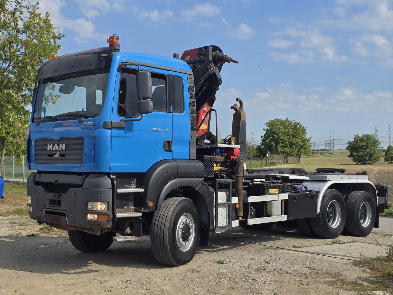 MAN TGA 33.430 6X6 / HMF 1823 K3+REM.CON./ HOOK SYSTEM 2x in stock - Camión multibasculante, Camión grúa: foto 3 MAN TGA 33.430 6X6 / HMF 1823 K3+REM.CON./ HOOK SYSTEM 2x in stock - Camión multibasculante, Camión grúa: foto 3